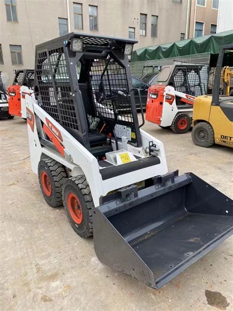 bobcat small skid steer used|smallest bobcat track loader.